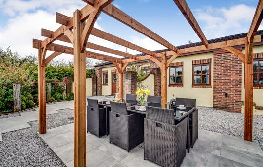  Outside dining under the pergola
