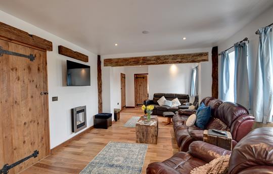 Comfortable seating with oak flooring 