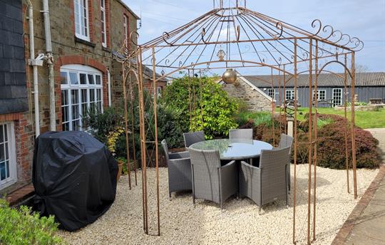 Manor House Apartment outside seating and table