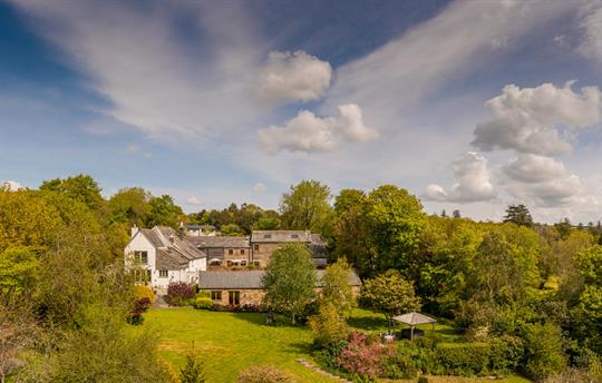 East Trenean Farm and cottages set in gardens.