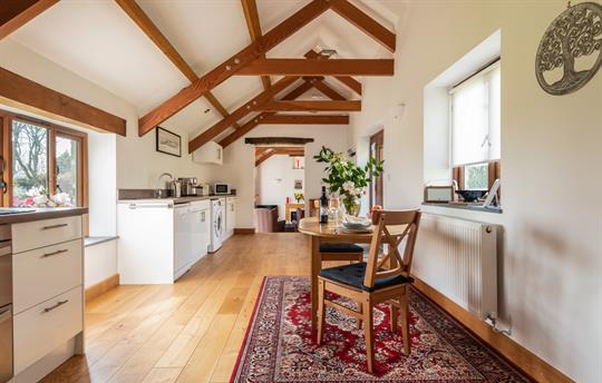 Linhay kitchen with dining area.
