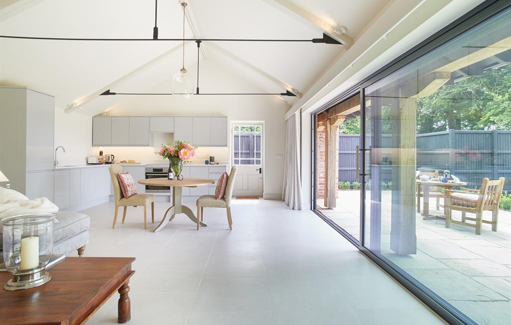 The living room opens directly onto the terrace