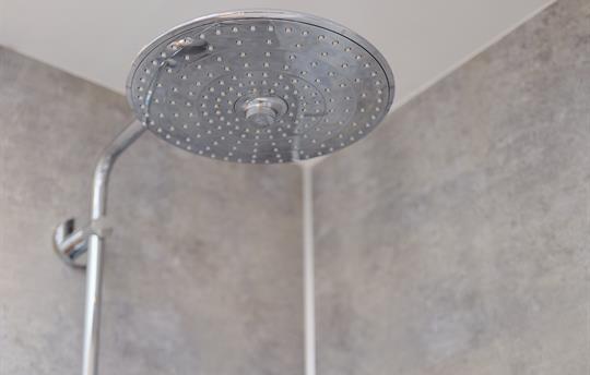 Relax in a lovely waterfall shower