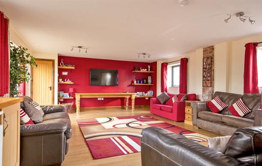 Unwind together in comfort in the Sitting Room