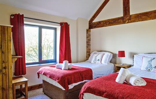 The twin bedroom with great country views