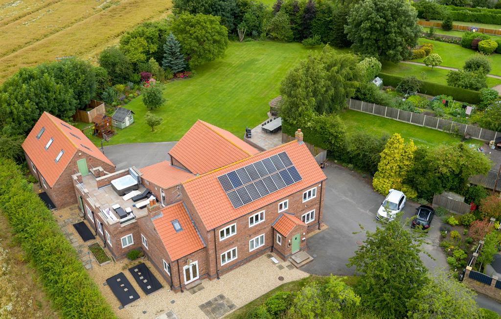 West Acre aerial view of house and plot