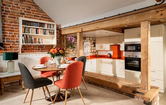 Old Dairy open plan dining area towards kitchen