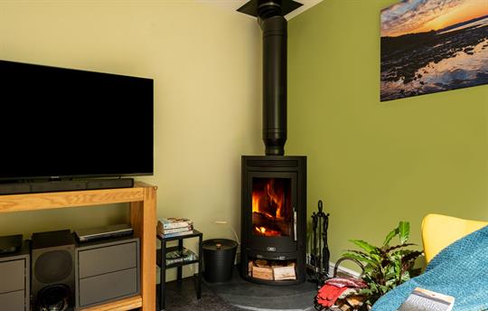 Log burner and TV at the Barn