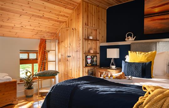 Chill out in the king bed in the main bedroom