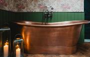 Copper bath tub in Lodge Cottage