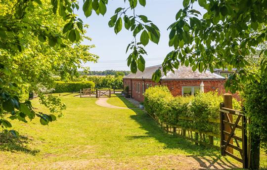 Avocet Cottage entrance and patio