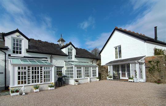 The Coach House is the cottage on the left