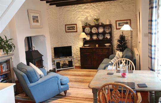 Sitting room with cosy woodburner