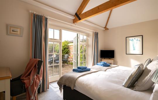 Garden Cottage patio indoors  from twin bedroom