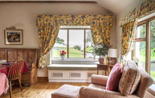 Rose Cottage living room with seaview