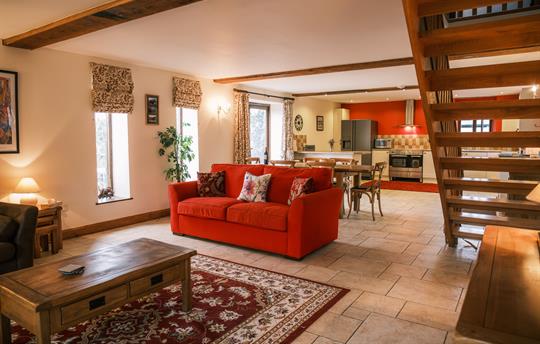 Open plan living room, dining and kitchen area