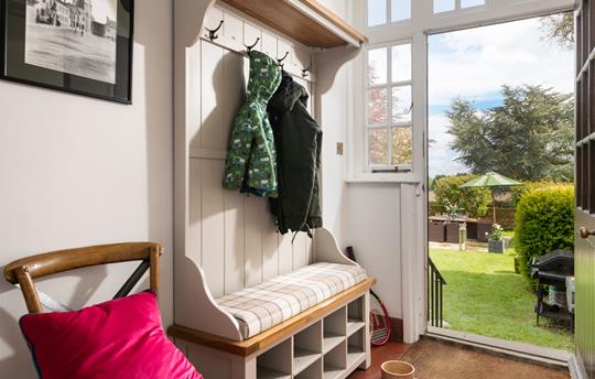 Coat hanging and back door