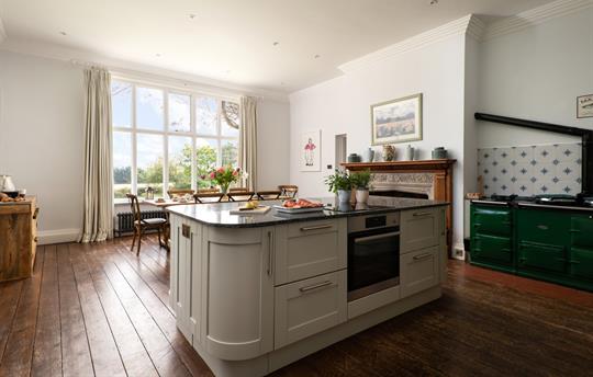 Kitchen with island and Aga