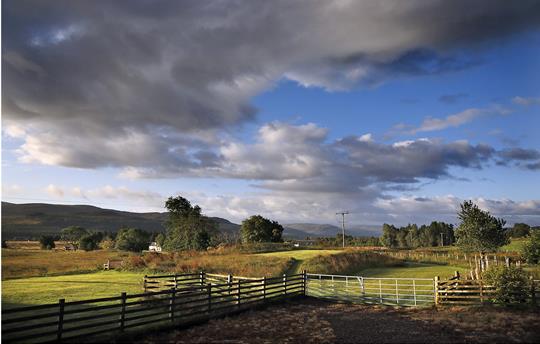 Gask House - view across gardens and farm 