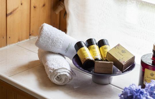 Toiletries, bath towels, slippers & beach towels