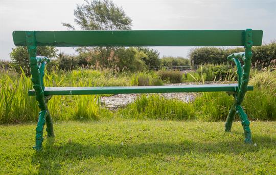 Bench and pond field House
