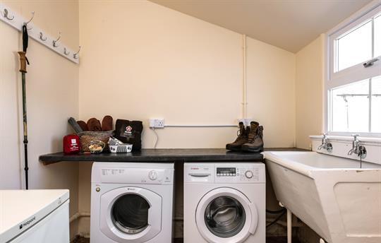 Utility room off kitchen ideal for dogs and boots