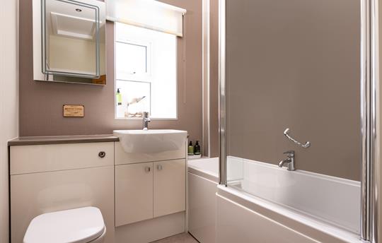 Shared bathroom by double and single bedrooms