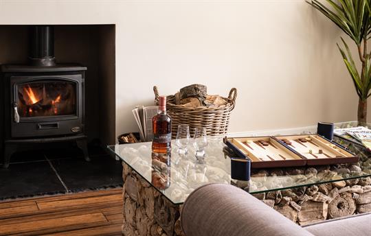 Cosy wood burner with logs and kindling supplied