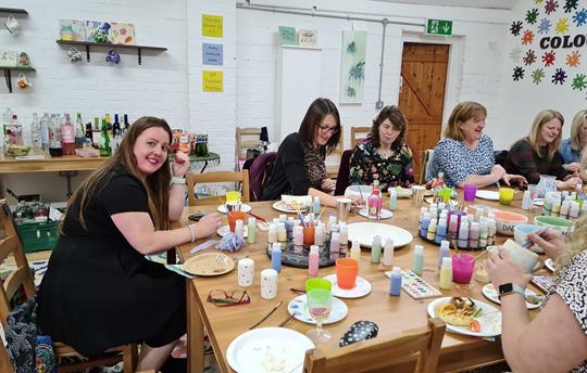 Group Fun at a "Doodle Alley" Pottery Party