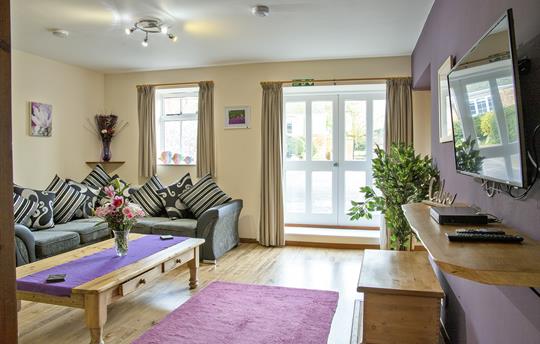 Relax together in your large sitting room