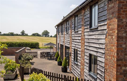 The front of Buttercups has a large enclosed patio