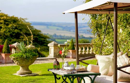 Outdoor dining with views of Dartmoor