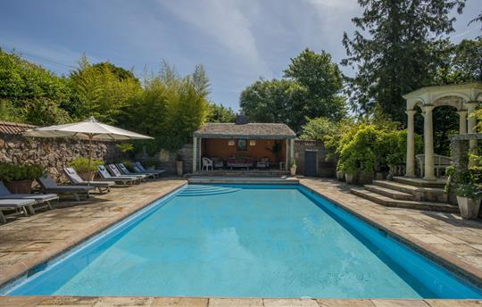 Heated pool with seating
