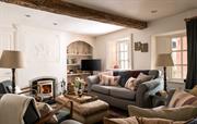 Cosy downstairs sitting room and log burner