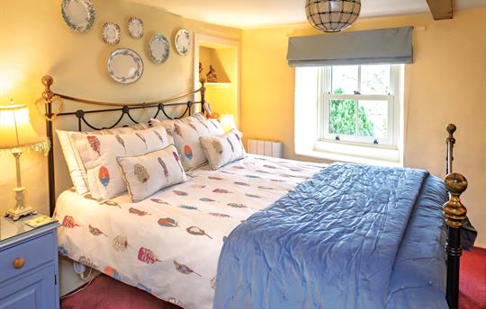 Minnie's Cottage king size bedroom