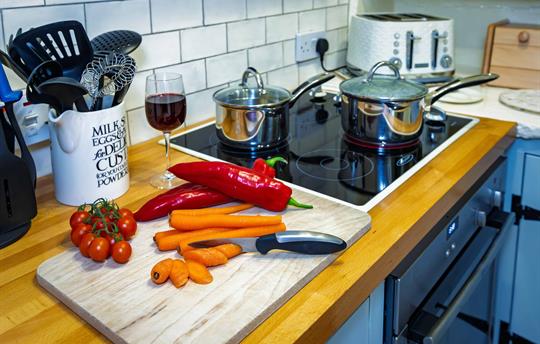 Preparing a delicious meal at Minnie's Cottage