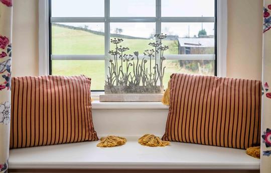 Window seat at Urlay Nook with view over fields