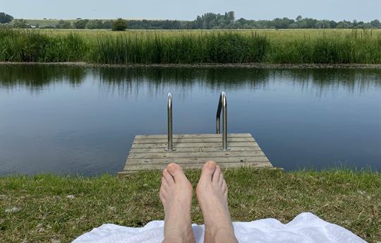 Sunbathing next to wild swimming platform