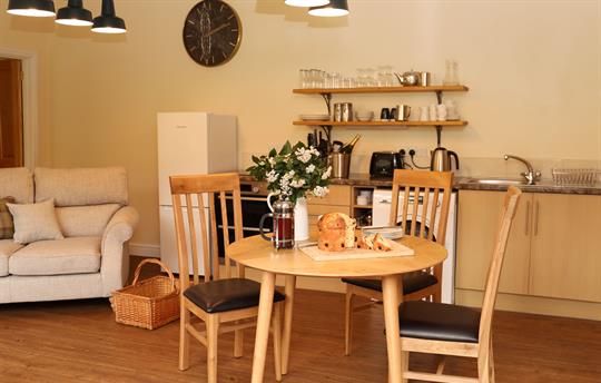 Open plan kitchen with dining area