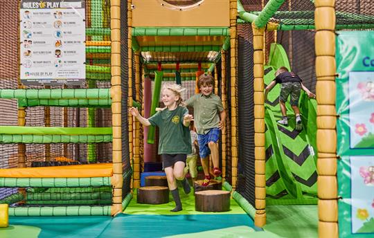 Large soft play area with games barn