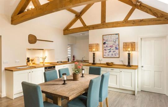 Dining area and kitchen at The Cider Mill