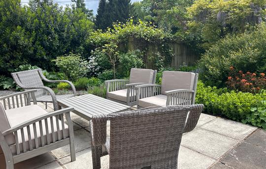 Soft outdoor sitting area at The Cider Mill