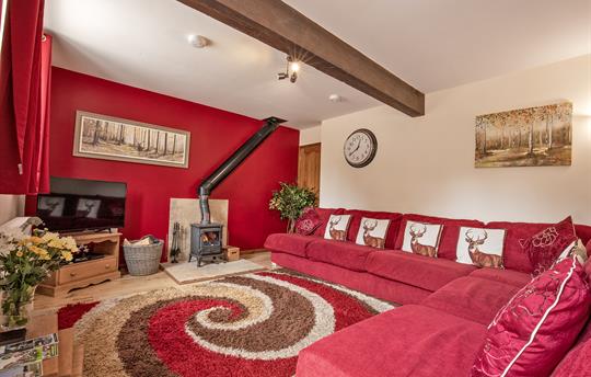 Relax in the sitting room with Wood Burning stove