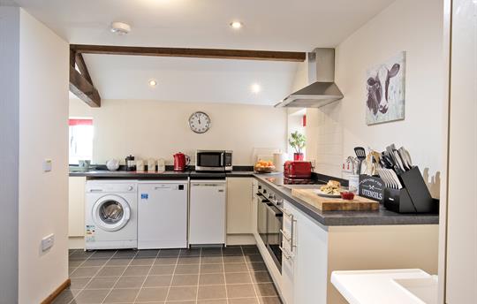 The kitchen is spacious and well equipped