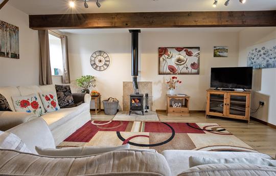 William's Hayloft sitting room with WoodBurner