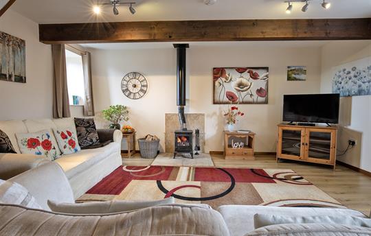 William's Hayloft sitting room with WoodBurner