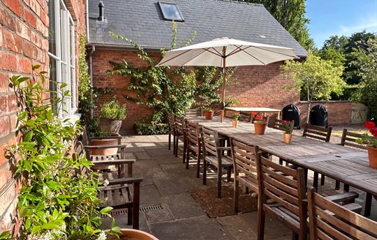 Morning sunshine on the outside dining table