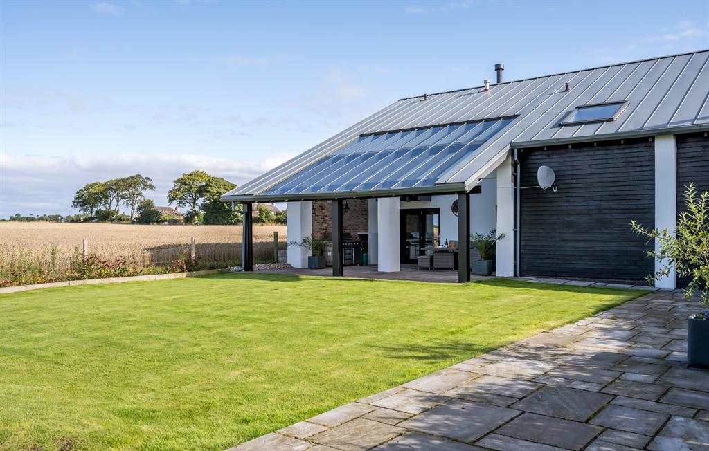 Rear view of Wester Den with enclosed garden