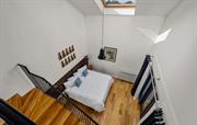 Bedroom suite with upper private lounge area