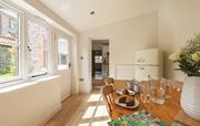 Dining area with view of kitchen entranceway